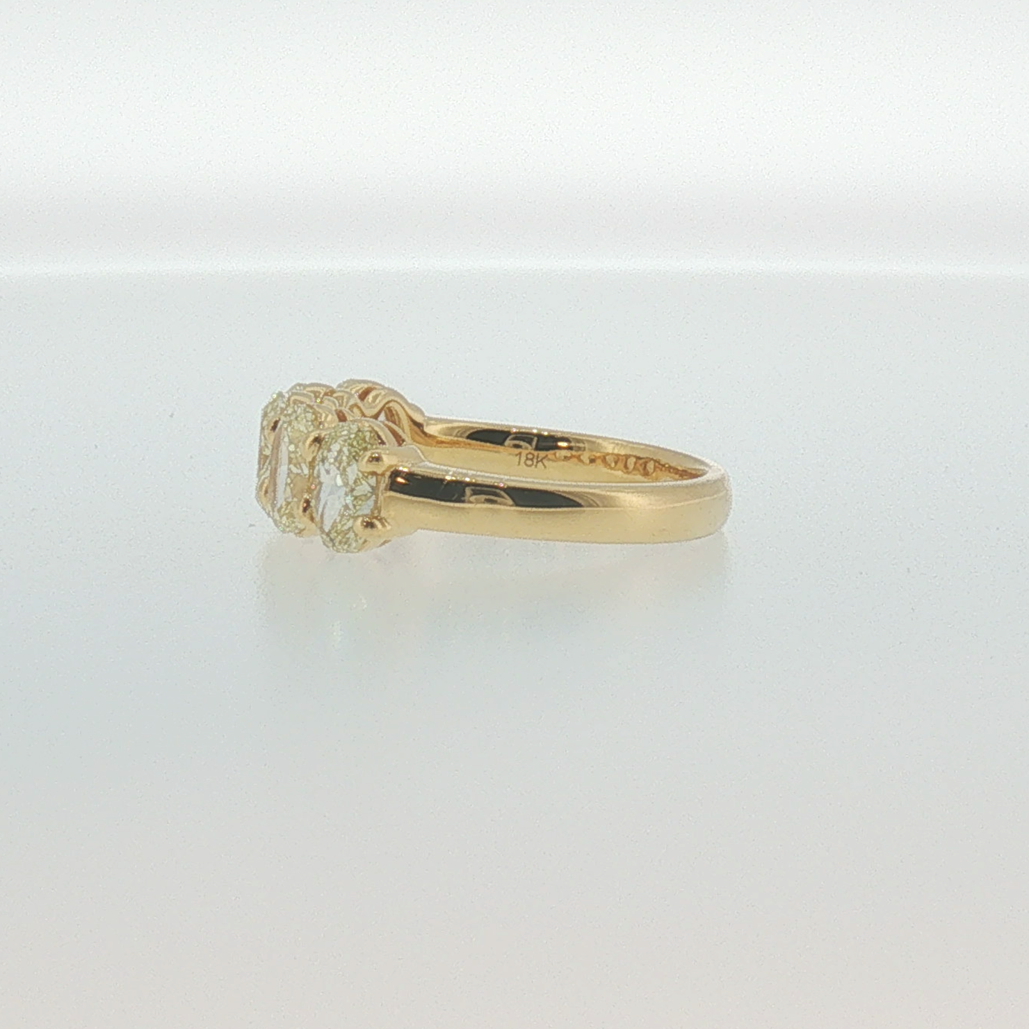 Fancy Yellow Oval Diamond Five-Stone Ring in Yellow Gold