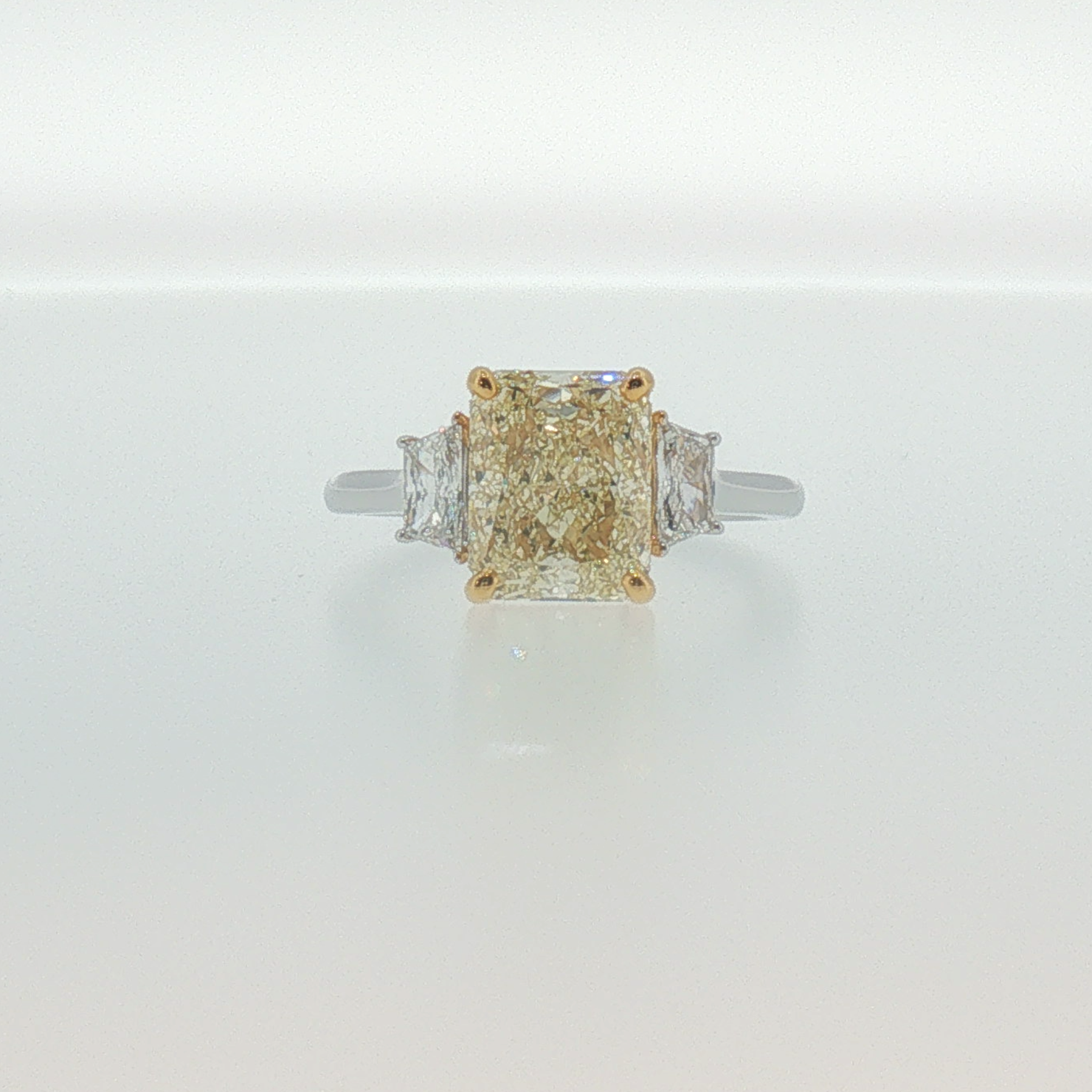 Fancy Yellow Diamond Three-Stone Ring in White Gold