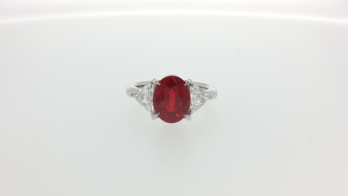 Oval Pigeon Blood Ruby Three-Stone Ring in White Gold