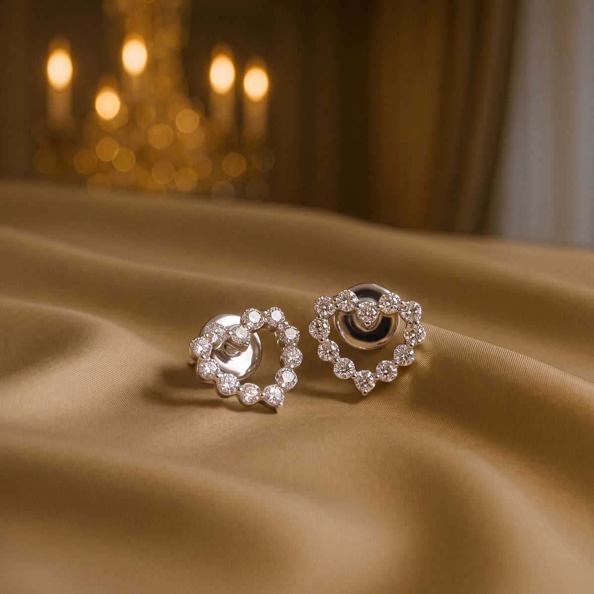 Pair of open heart studs traced with round diamonds