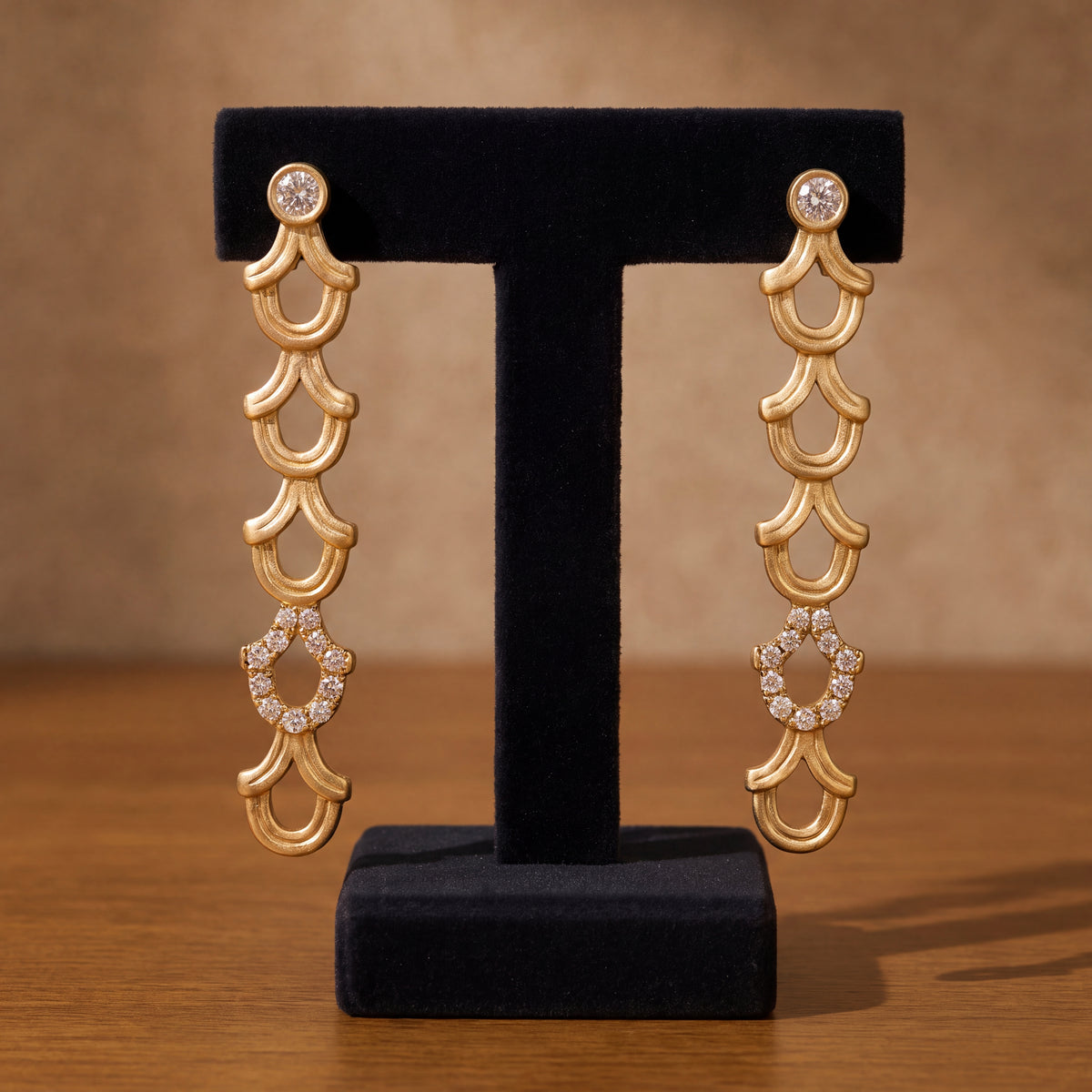 Matte yellow gold scalloped drop earrings with diamond accents