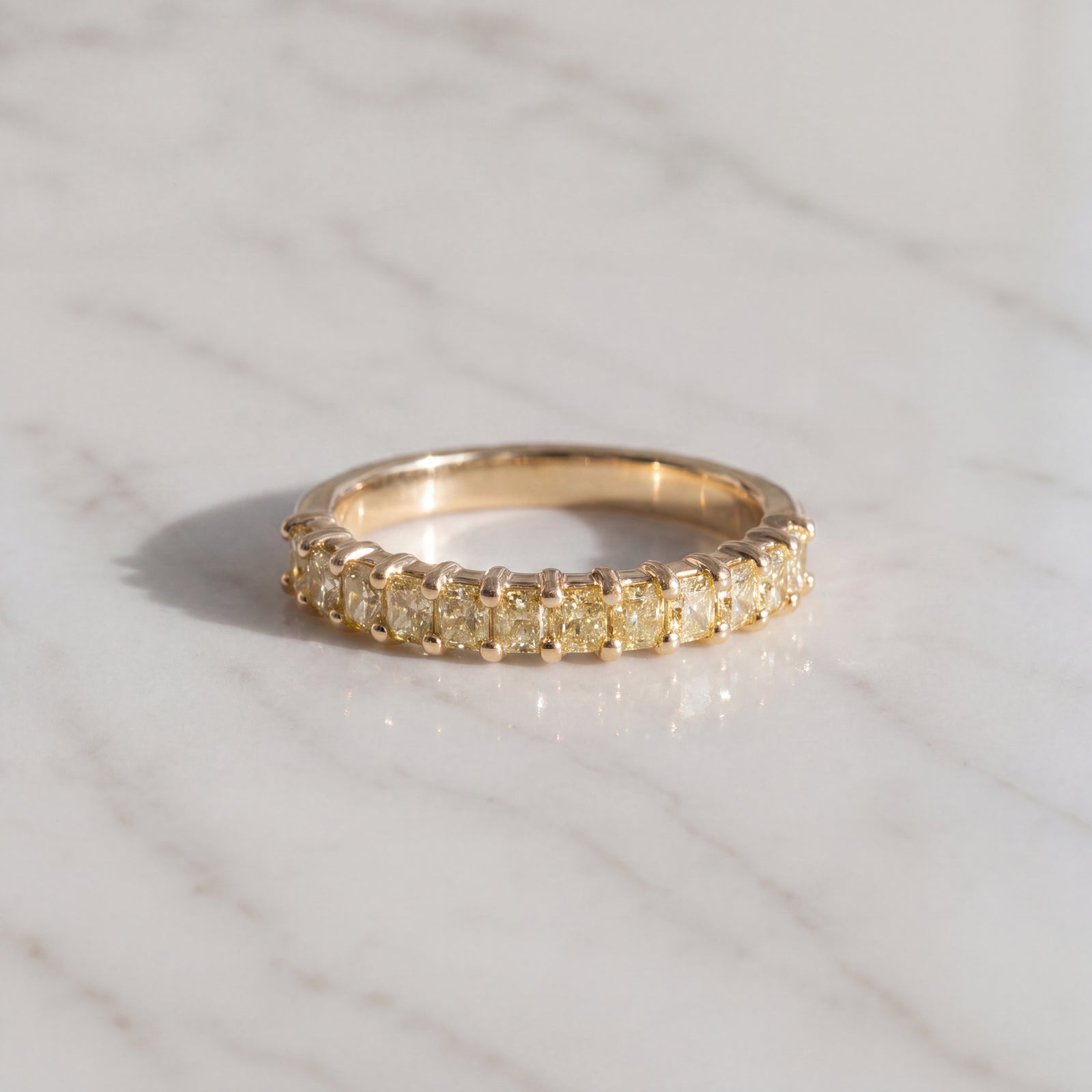 Fancy Yellow Diamond Shared Prong Band in Yellow Gold