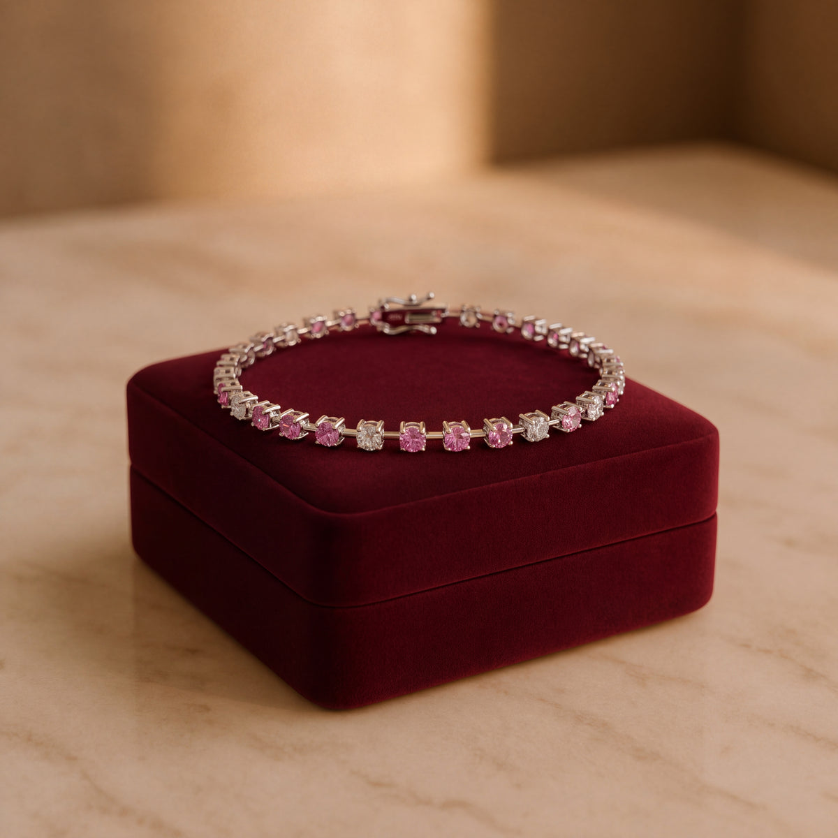 Pink sapphire tennis bracelet in white gold