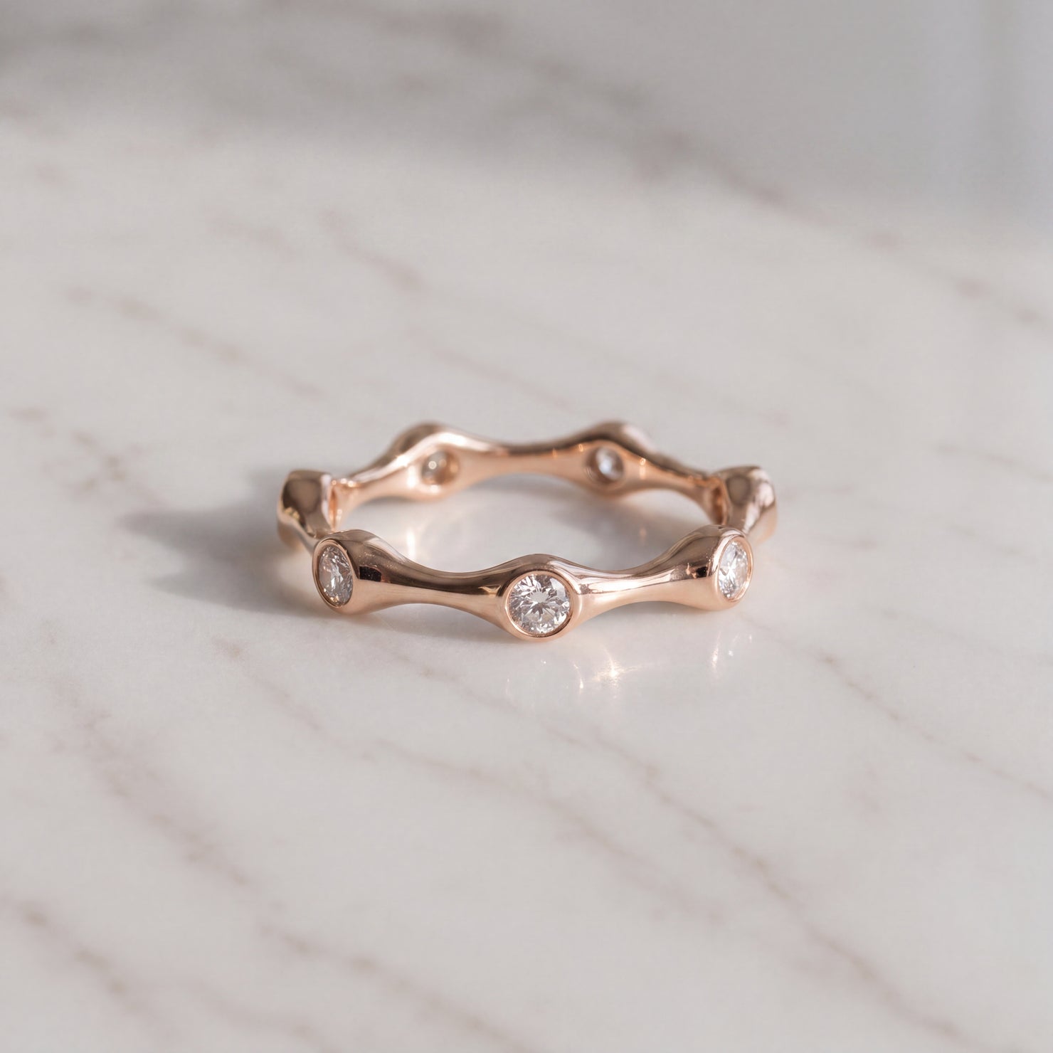 Bezel-Set Diamond Wavy Eternity Ring in Rose Gold