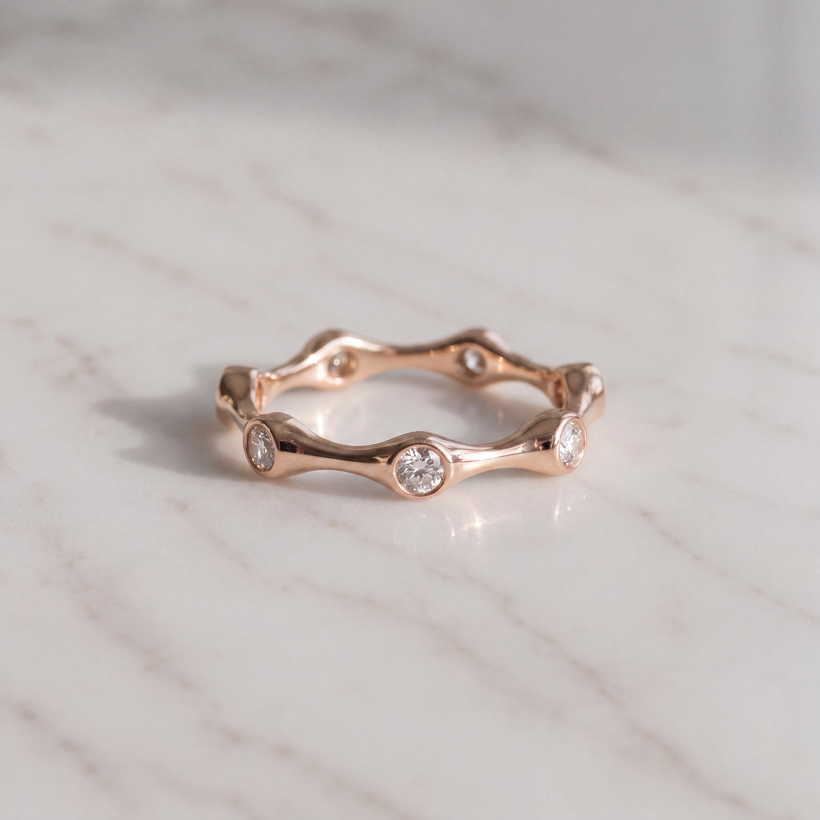 Bezel-Set Diamond Wavy Eternity Ring in Rose Gold