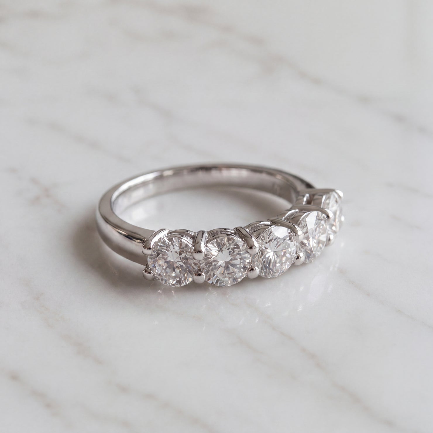 White Gold Diamond Shared Prong Band