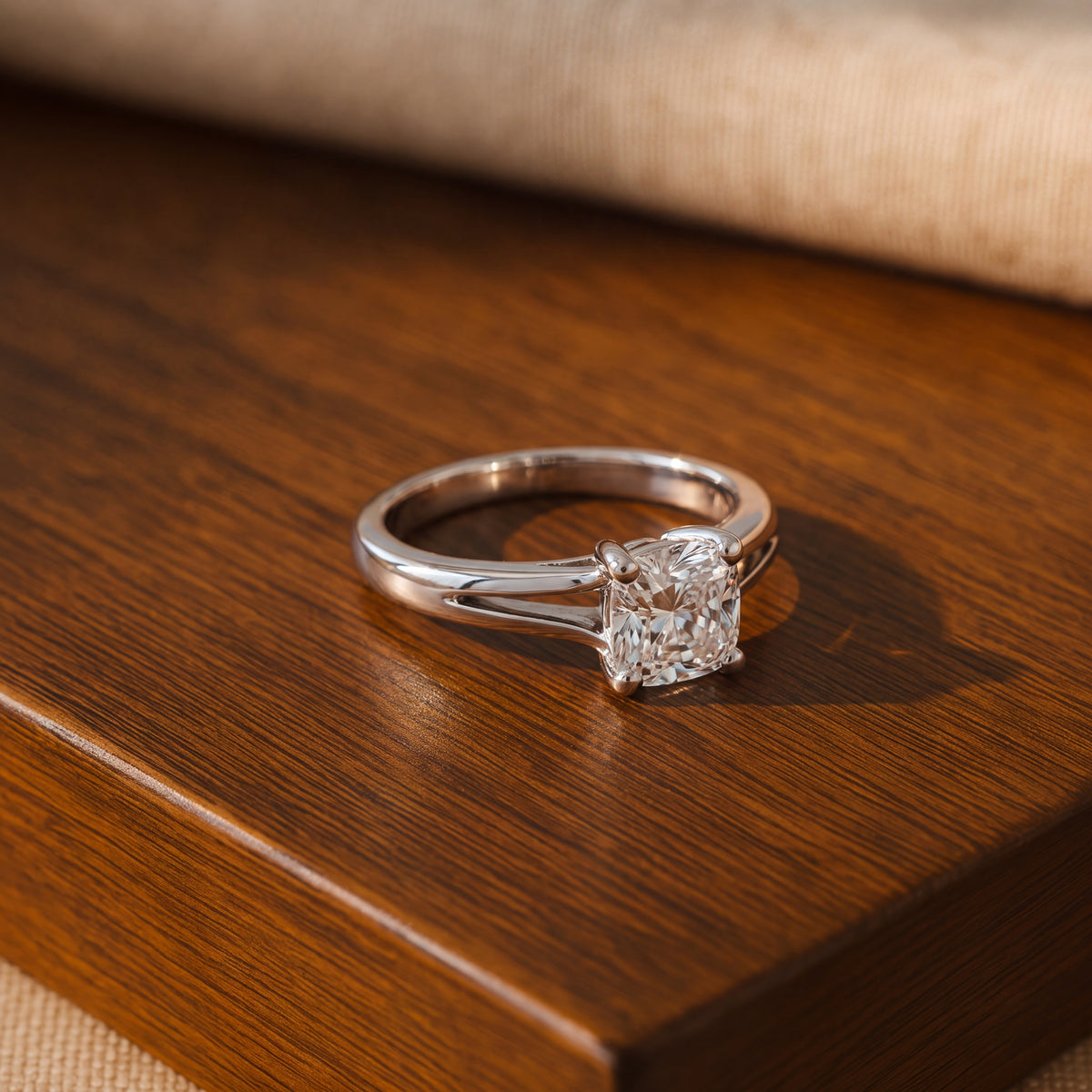 Diamond solitaire ring on a white gold split-shank band