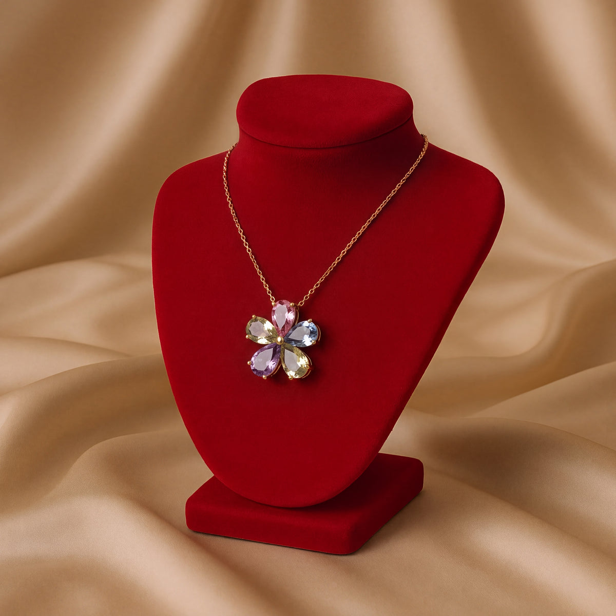 Flower pendant of five pear-shaped pastel sapphires