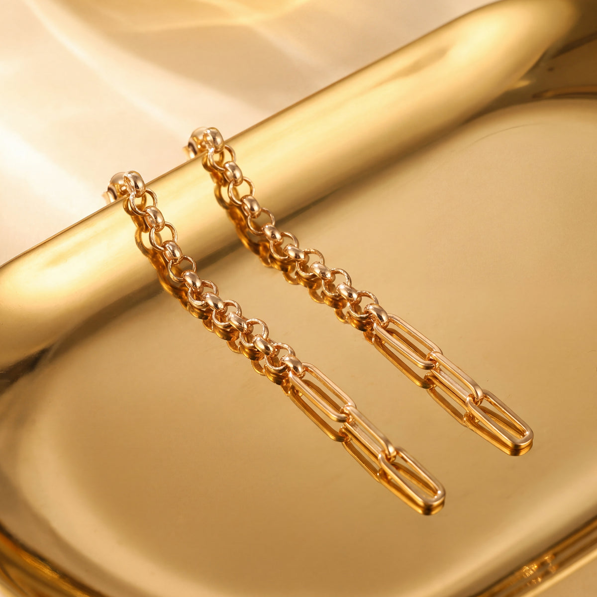 Long yellow gold dangle earrings of rolo and paperclip links