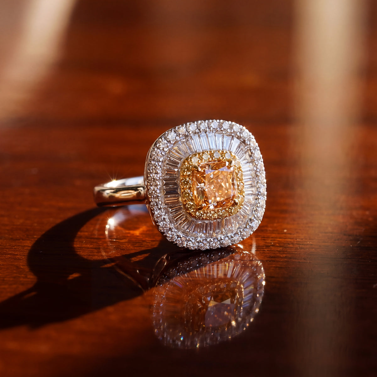 Fancy yellow diamond in a double halo of yellow diamonds and baguettes