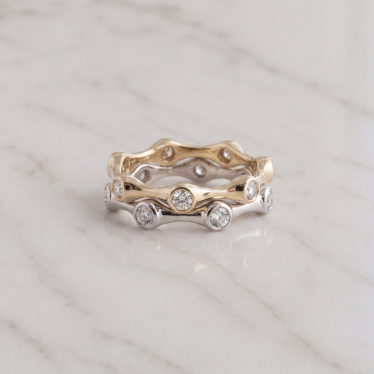 0.76 ct Wavy Bezel-Set Diamond Stackable Rings in 14K Yellow and White Gold