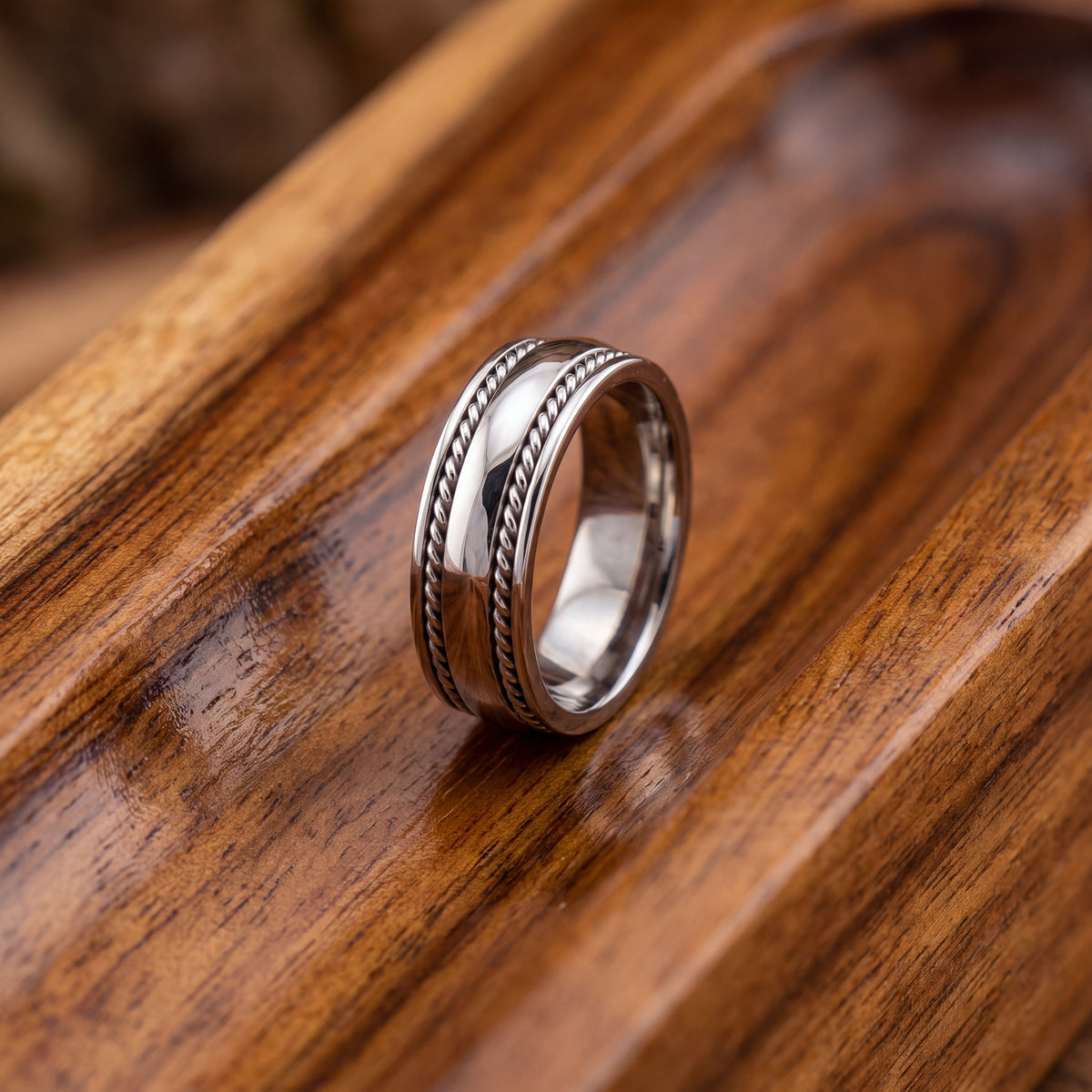 White gold band with twisted rope edges