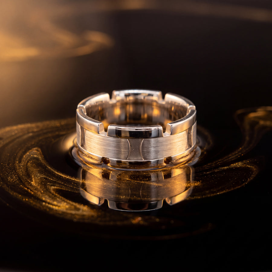 Wide geometric link band ring with brushed matte center links and polished outer edges