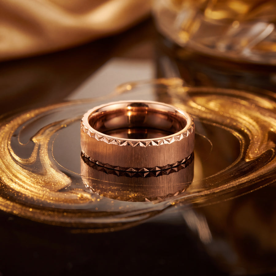 14K rose gold band ring with a brushed matte center and faceted geometric edges