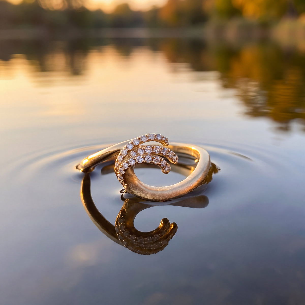 Yellow gold wave ring with sweeping rows of diamonds