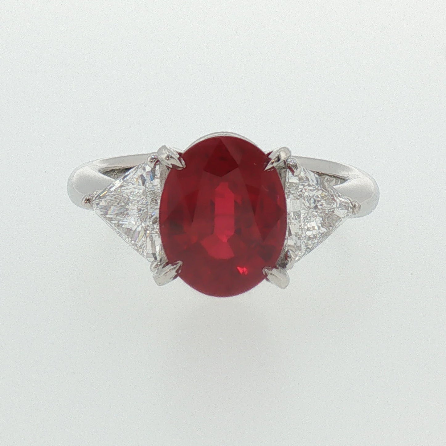 Oval Pigeon Blood Ruby Three-Stone Ring in White Gold