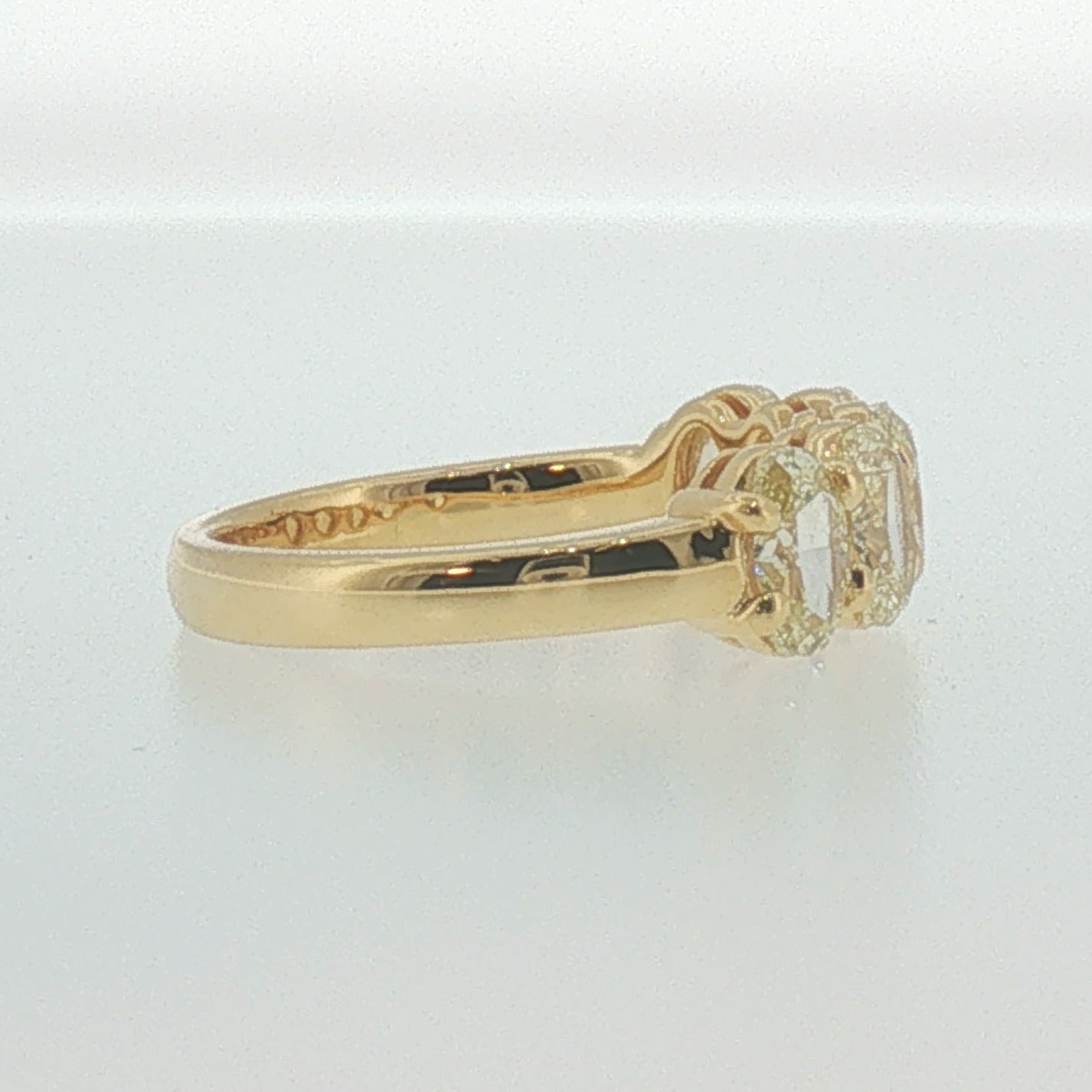 Fancy Yellow Oval Diamond Five-Stone Ring in Yellow Gold