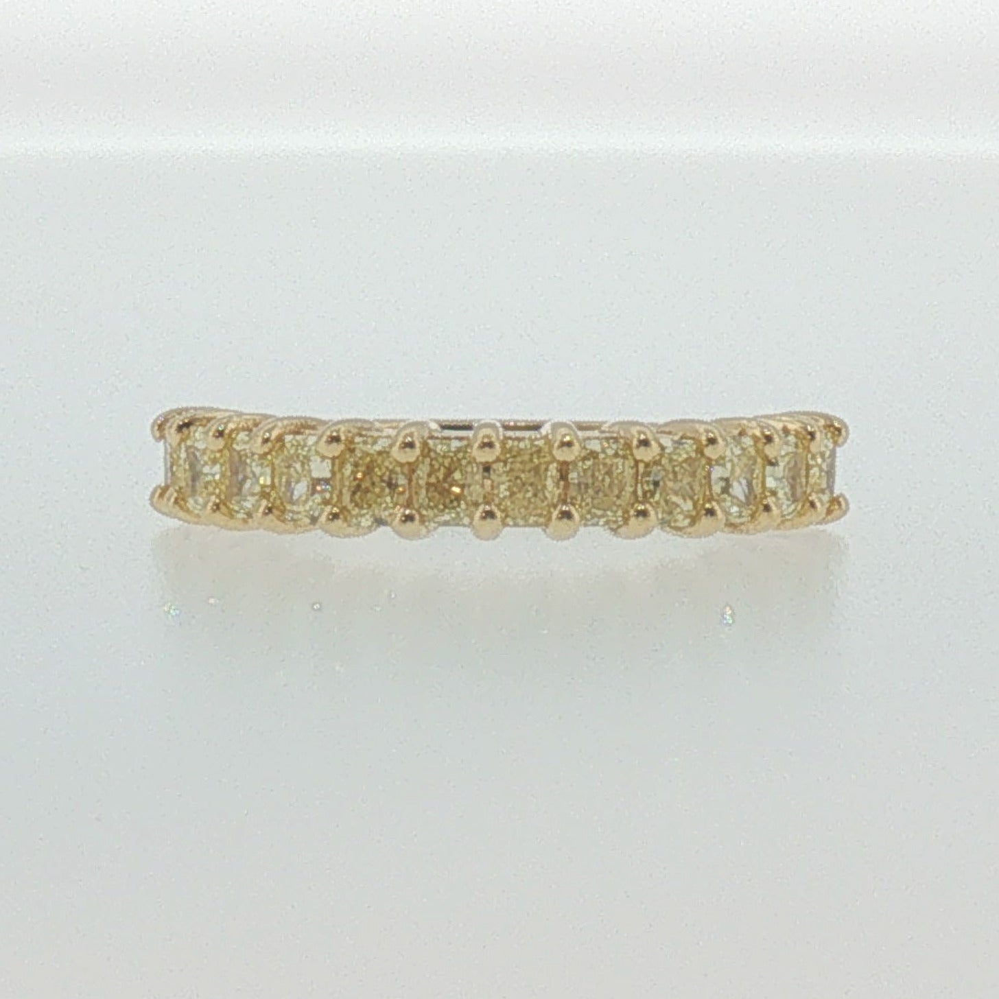 Fancy Yellow Diamond Shared Prong Band in Yellow Gold