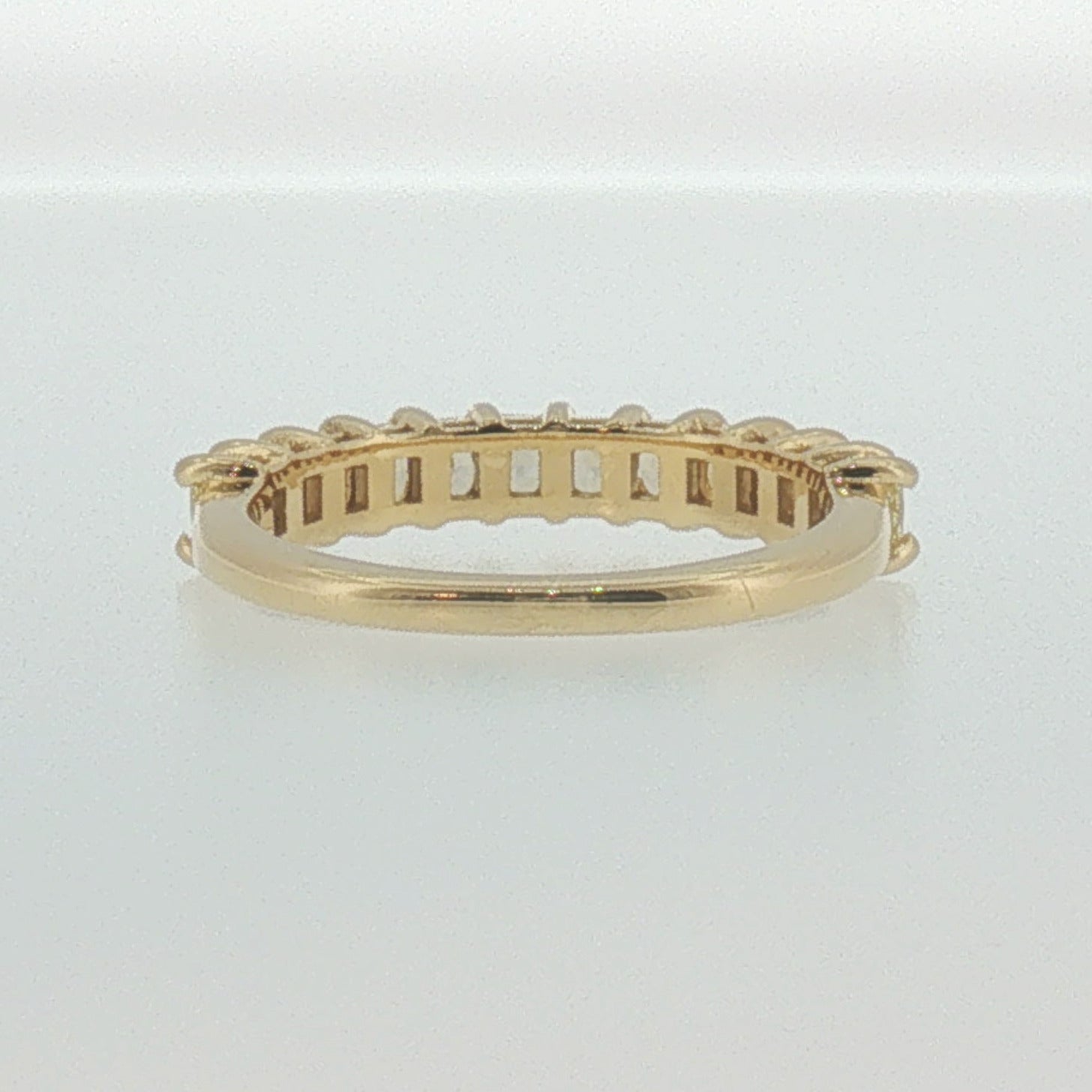 Fancy Yellow Diamond Shared Prong Band in Yellow Gold