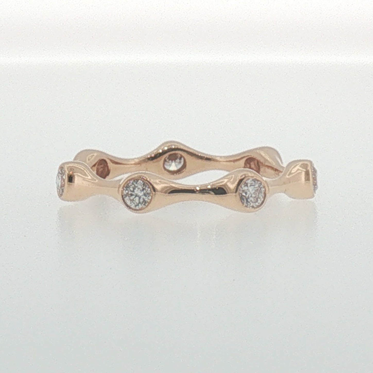 Bezel-Set Diamond Wavy Eternity Ring in Rose Gold