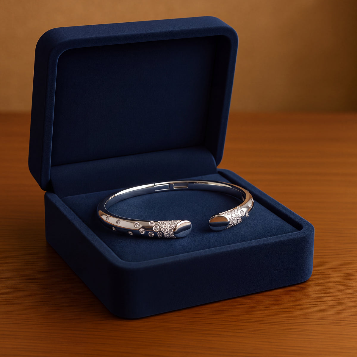 White gold open bangle with scattered diamonds