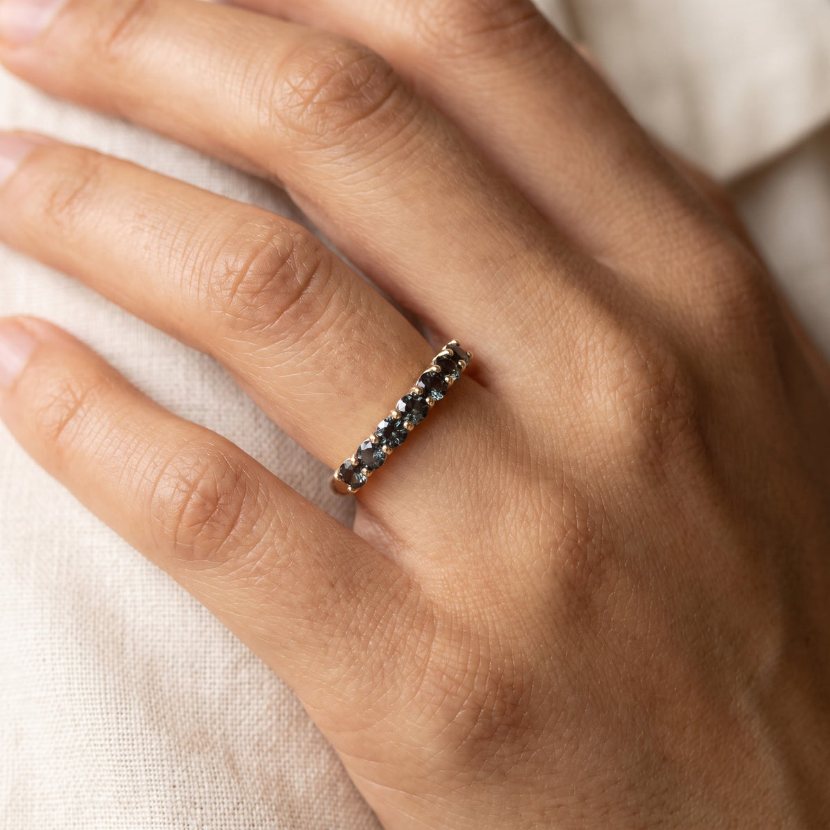 Alexandrite Shared-Prong Band in Yellow Gold, worn