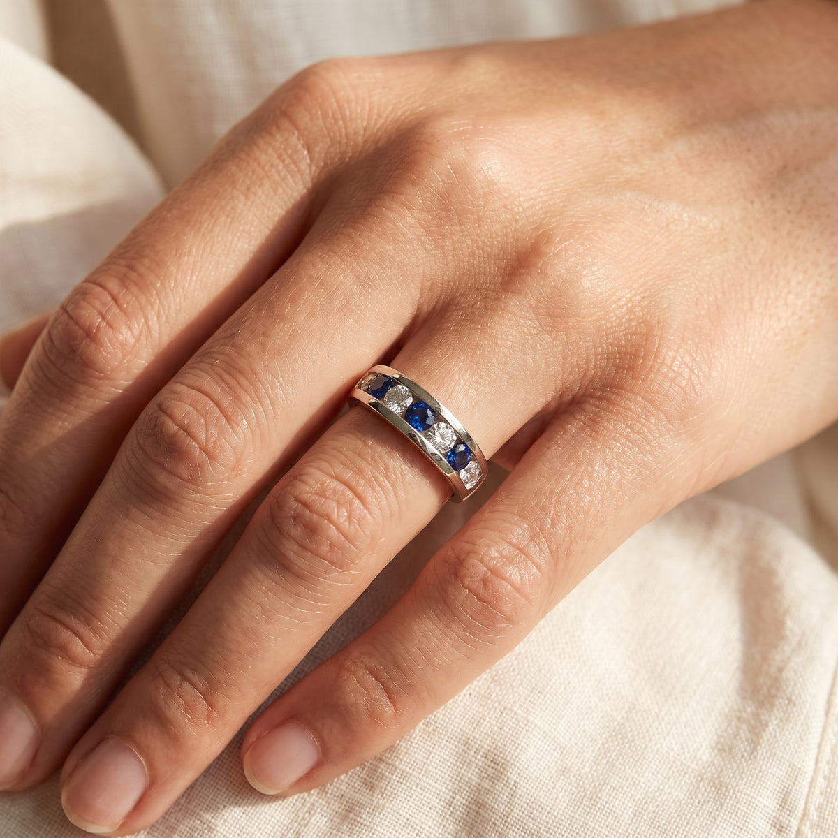 Alternating Royal Blue Sapphire Band Ring in White Gold, worn