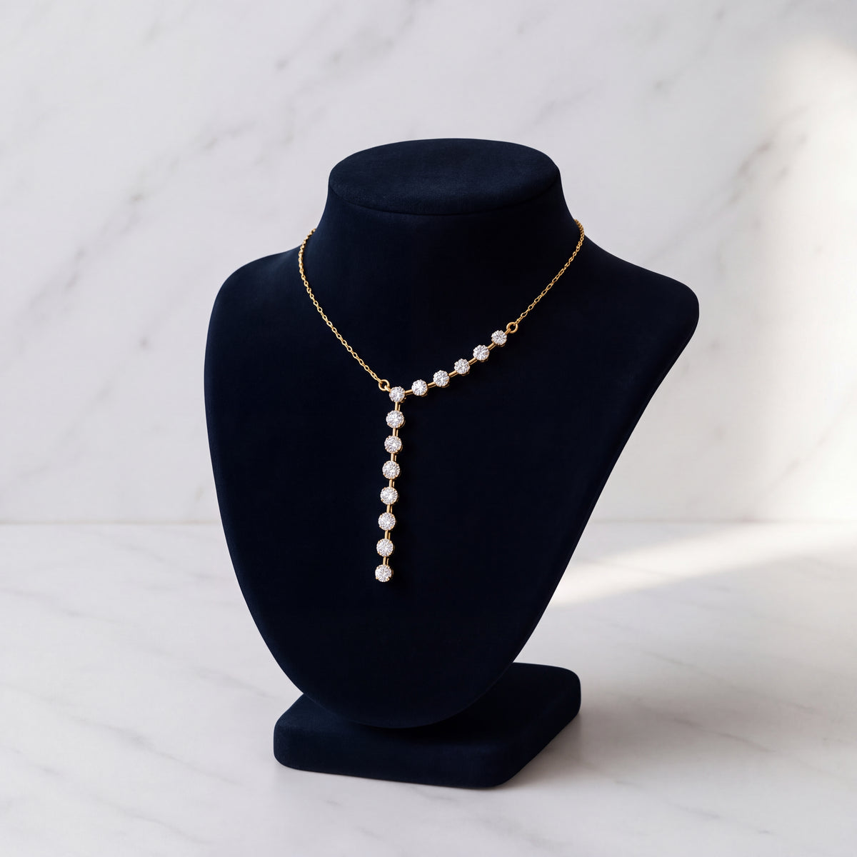 Yellow gold Y-necklace with a cascade and a drop of diamonds