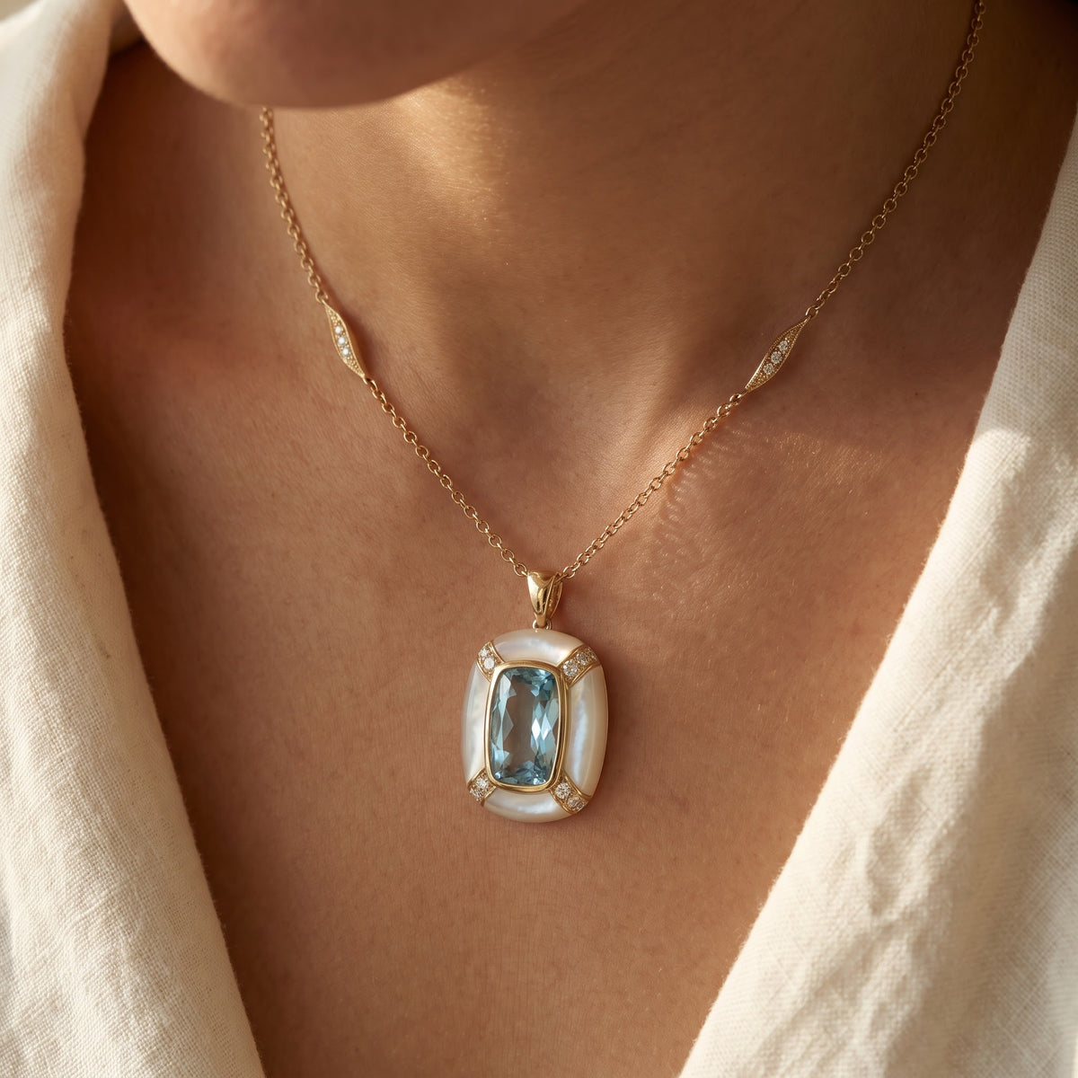 Blue Topaz, Mother-of-Pearl and Diamond Charm Necklace in 18K Yellow Gold, worn