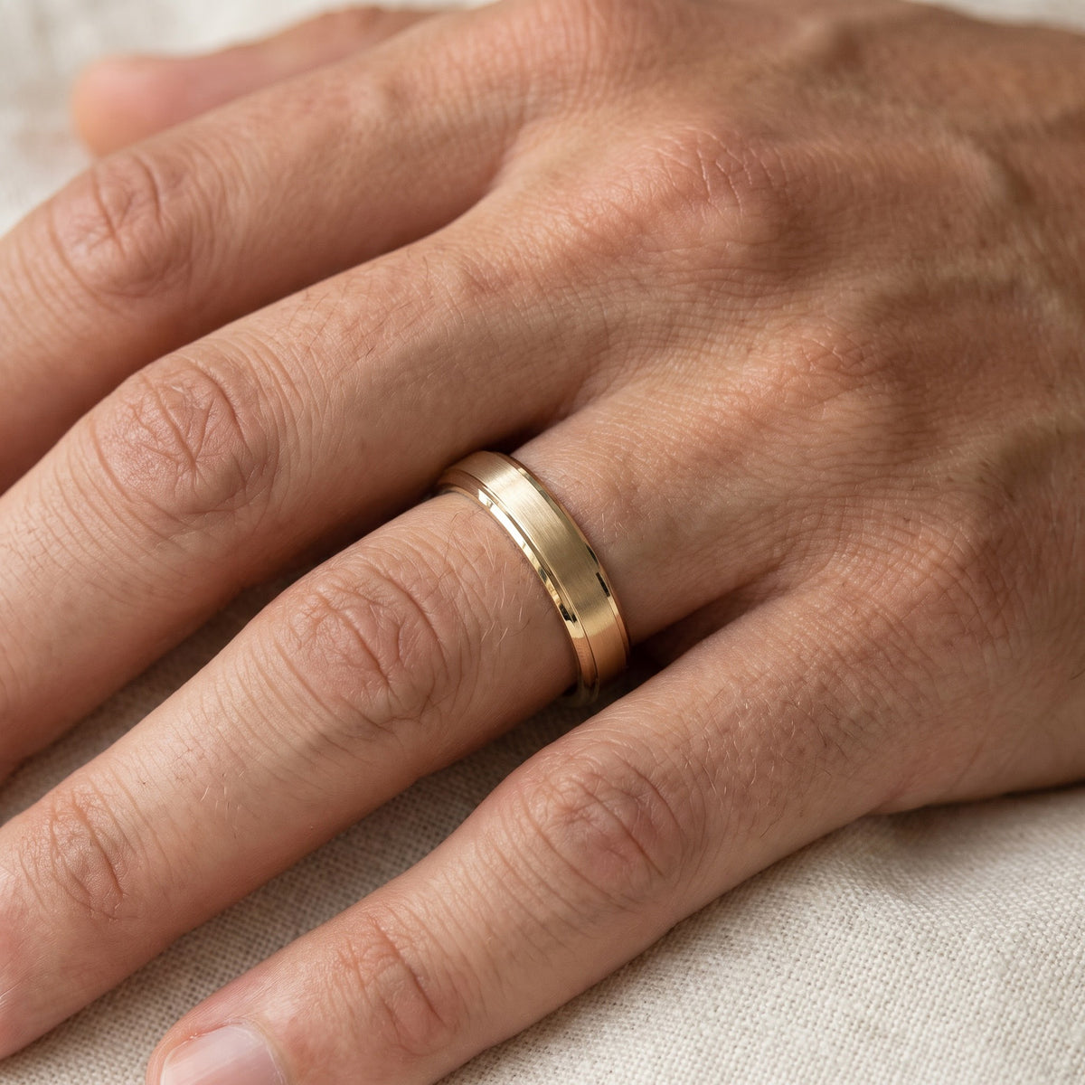 Brushed Yellow Gold Band Ring with Polished Beveled Edges, worn