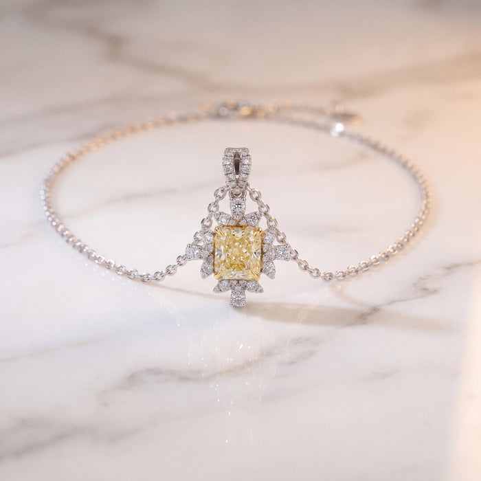 A yellow diamond starburst pendant turning