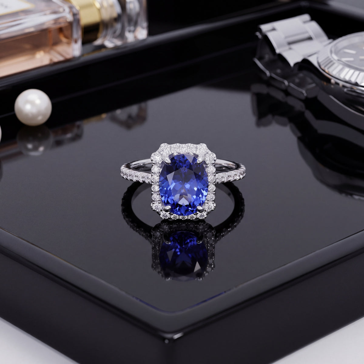 Tanzanite in a diamond halo on a slender white gold band
