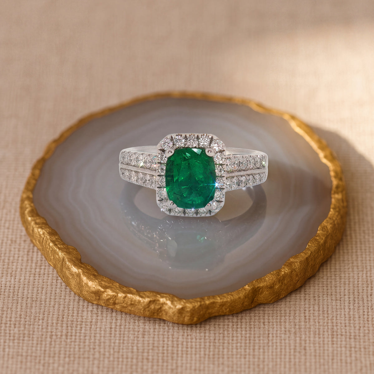 1.32 ct Emerald and Diamond Halo Split Shank Ring in 14K White Gold