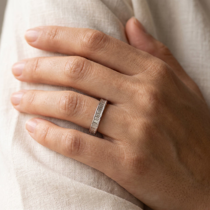 Channel-Set Baguette Diamond Eternity Ring in White Gold, worn