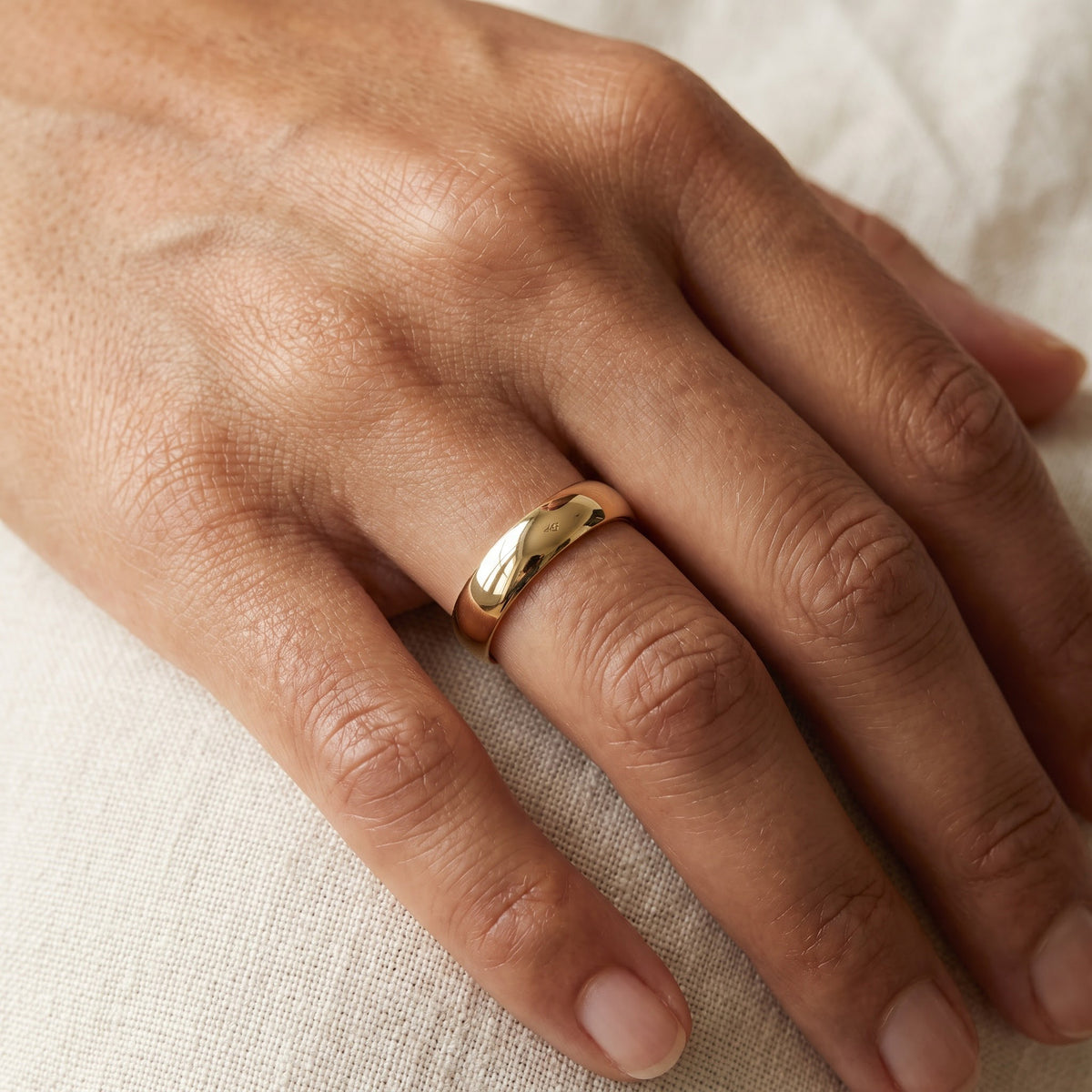 Classic Polished 6mm Wedding Band in 14K Yellow Gold, worn