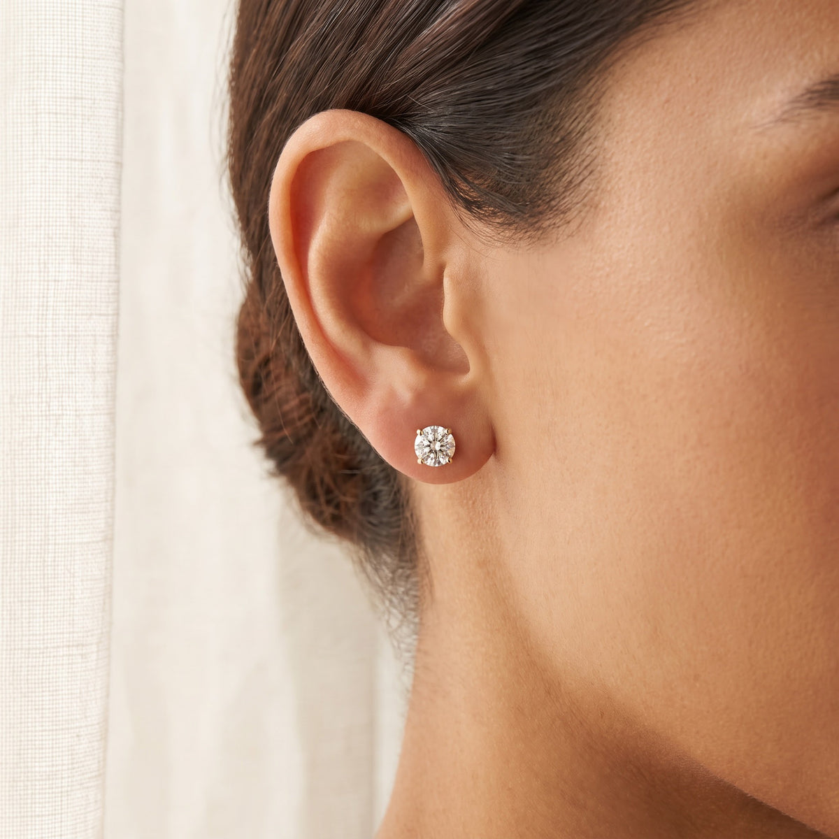 Classic Round Diamond Stud Earrings in Yellow Gold, worn