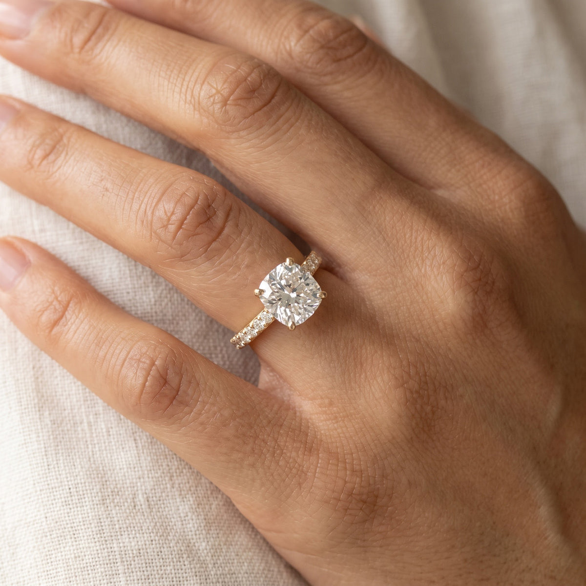 Cushion Cut Diamond Ring with Pavé Yellow Gold Band, worn