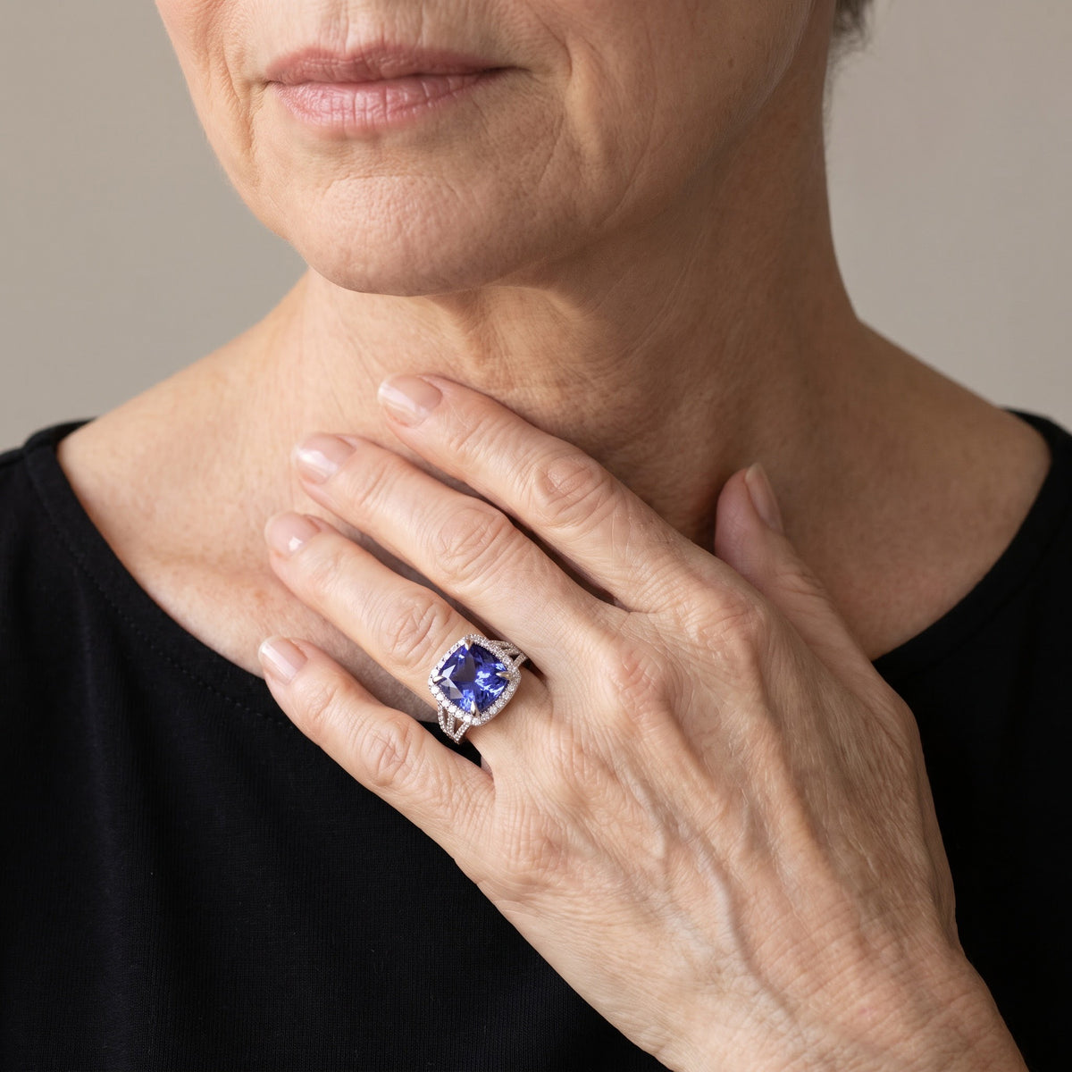 Cushion Cut Tanzanite and Diamond Halo White Gold Ring, worn