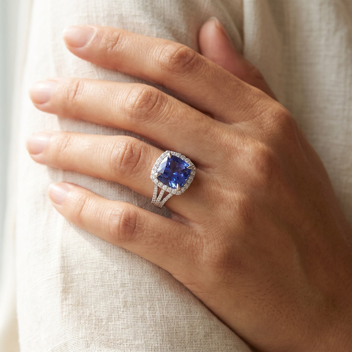 Cushion Cut Tanzanite and Diamond Halo White Gold Ring, worn
