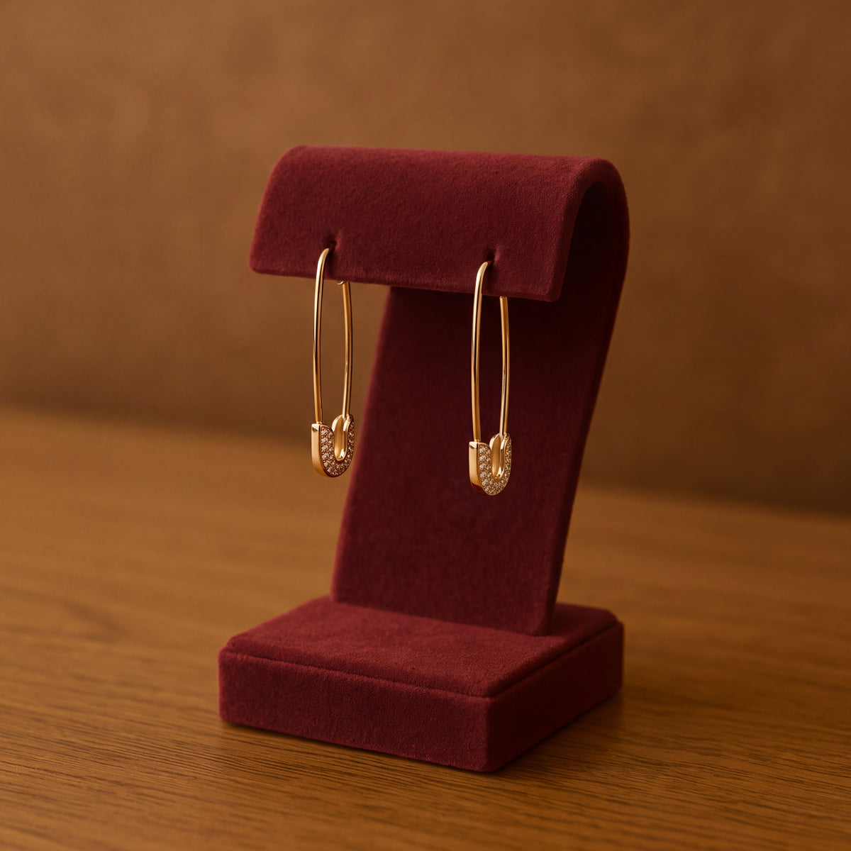 Yellow gold safety pin drop earrings with diamonds