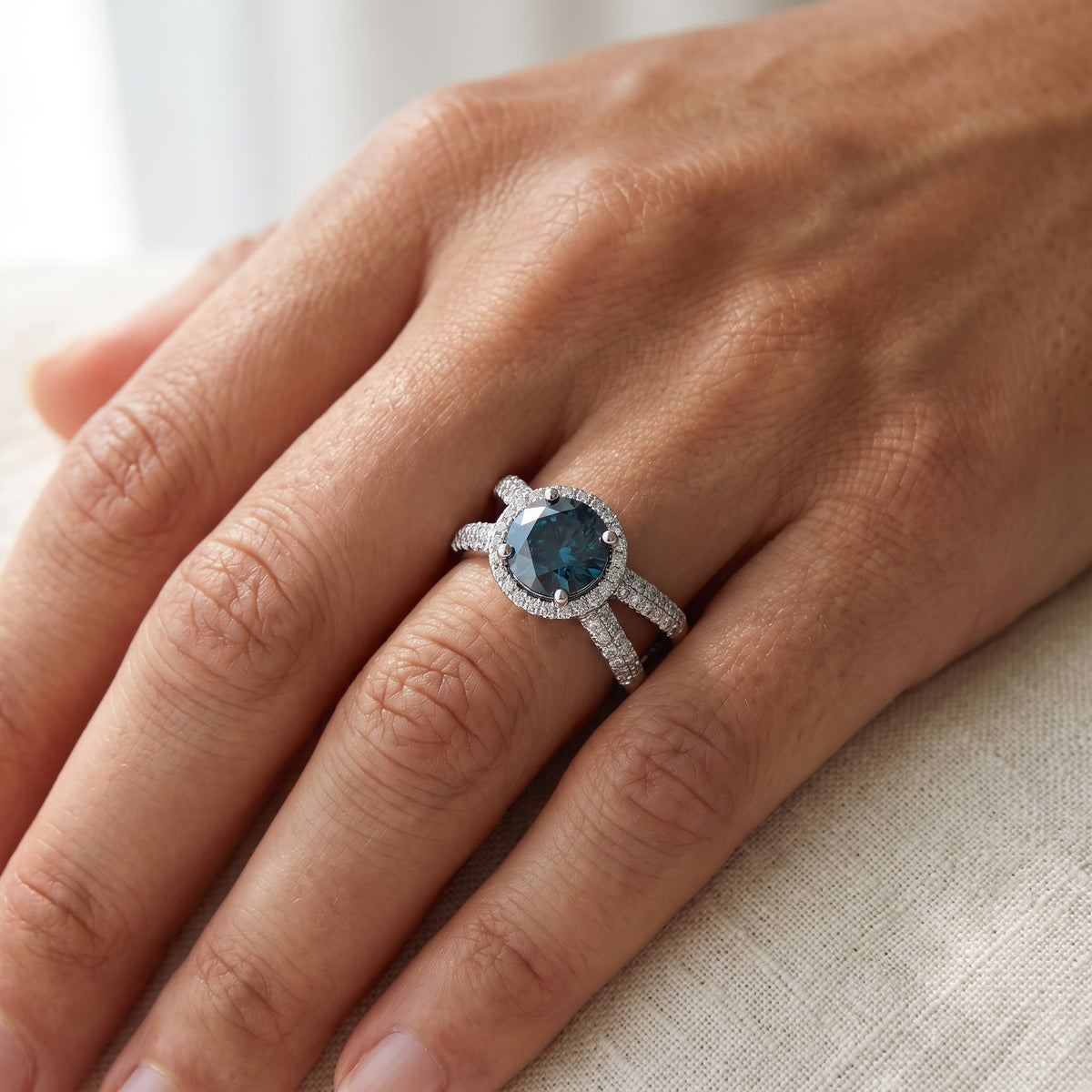 Deep Blue Diamond Halo Split-Shank Cocktail Ring, worn
