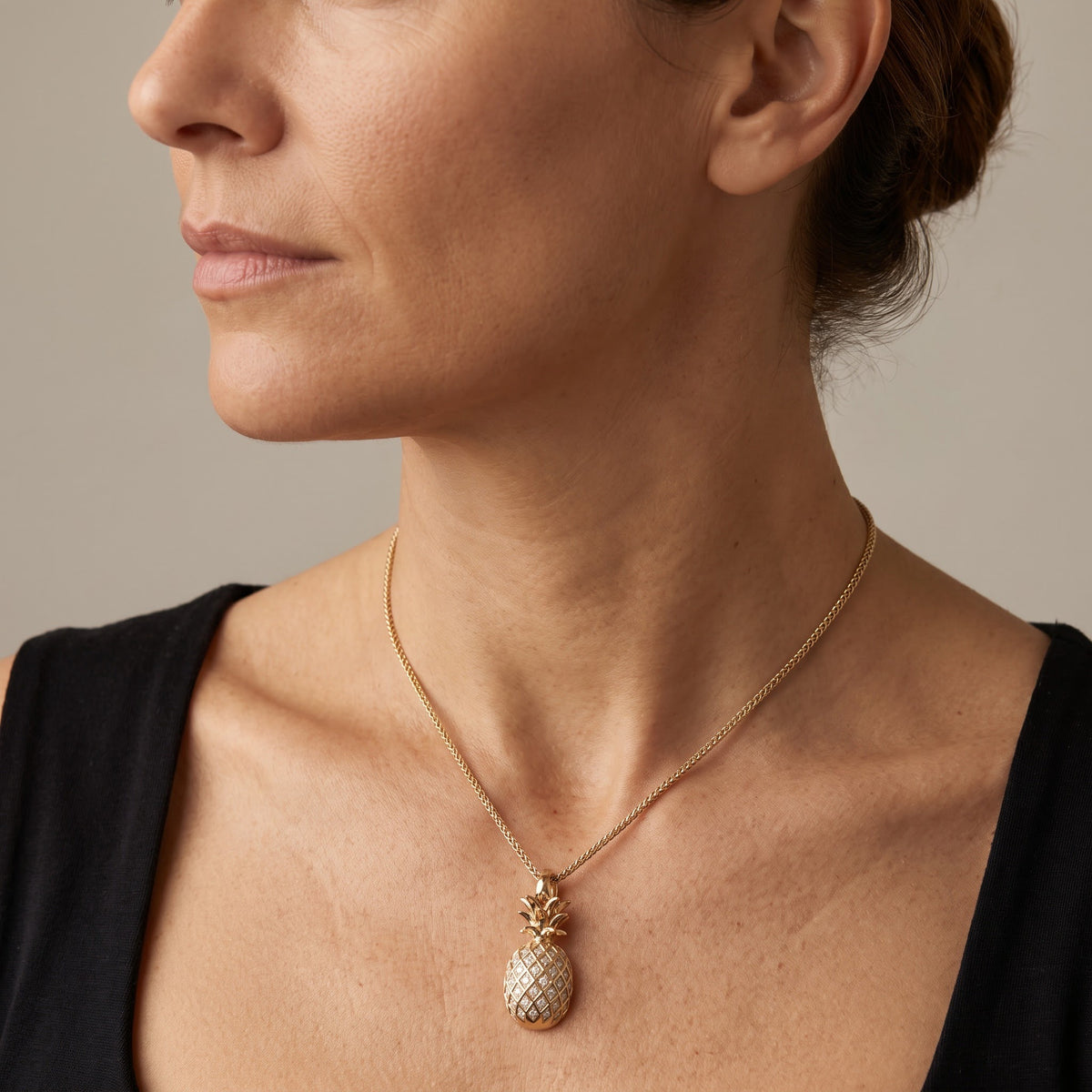 Diamond-Accented Pineapple Charm Necklace in Yellow Gold, worn, second view