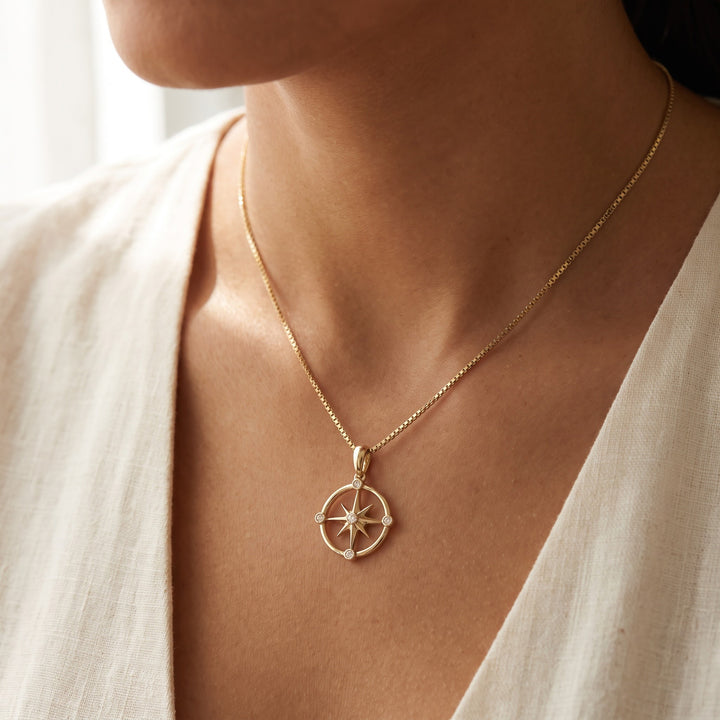 0.09 ct Diamond Compass Pendant Necklace in 14K Yellow Gold, worn