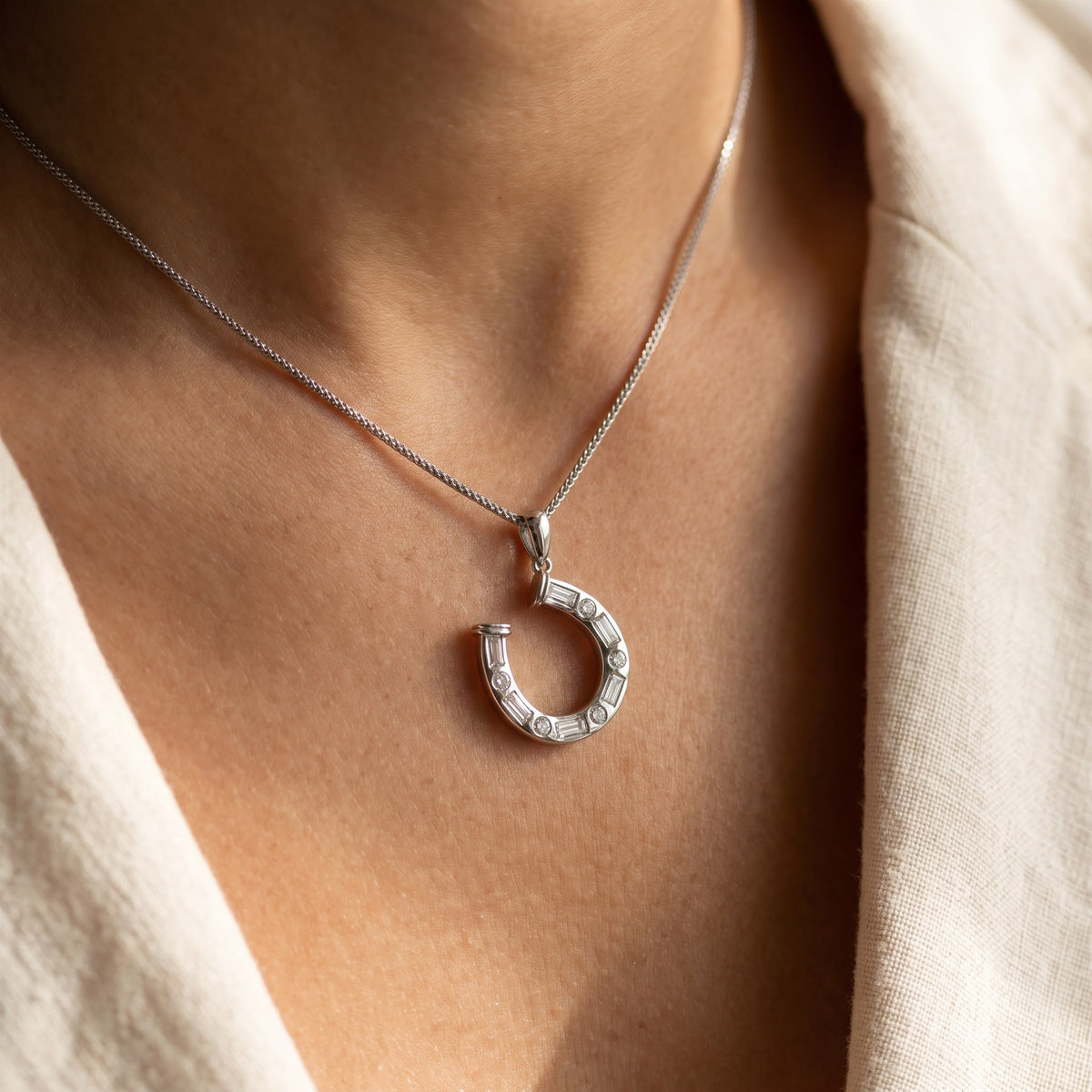 Diamond Horseshoe Pendant in White Gold, worn