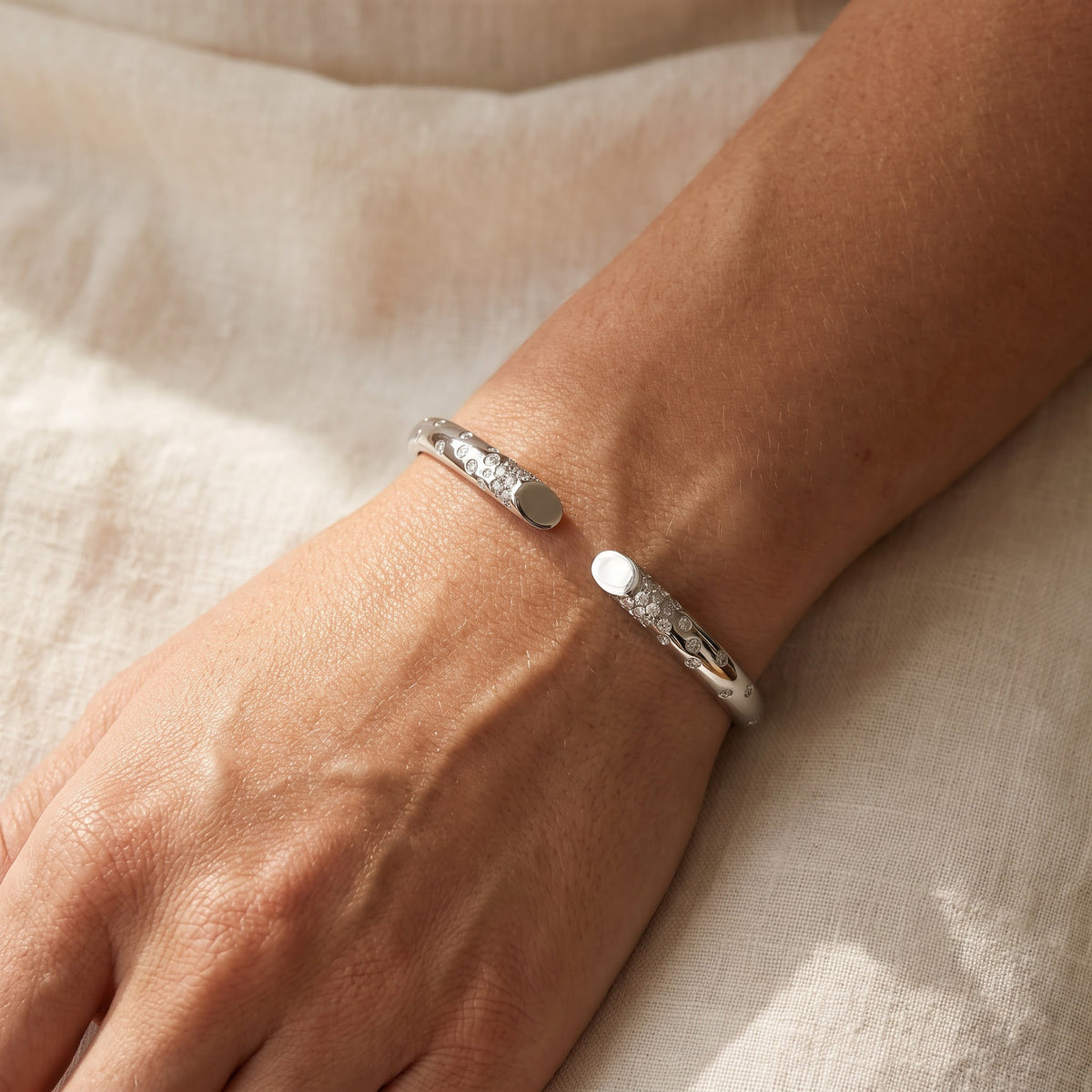 Diamond Scattered Open Bangle in White Gold, worn