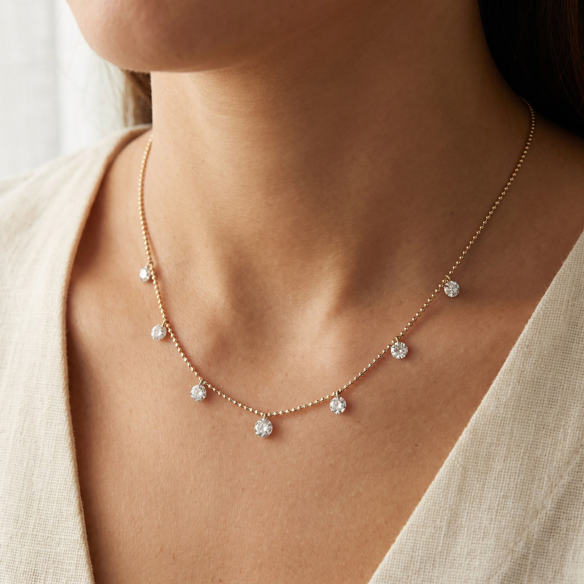 Diamond Station Necklace in Yellow Gold, worn