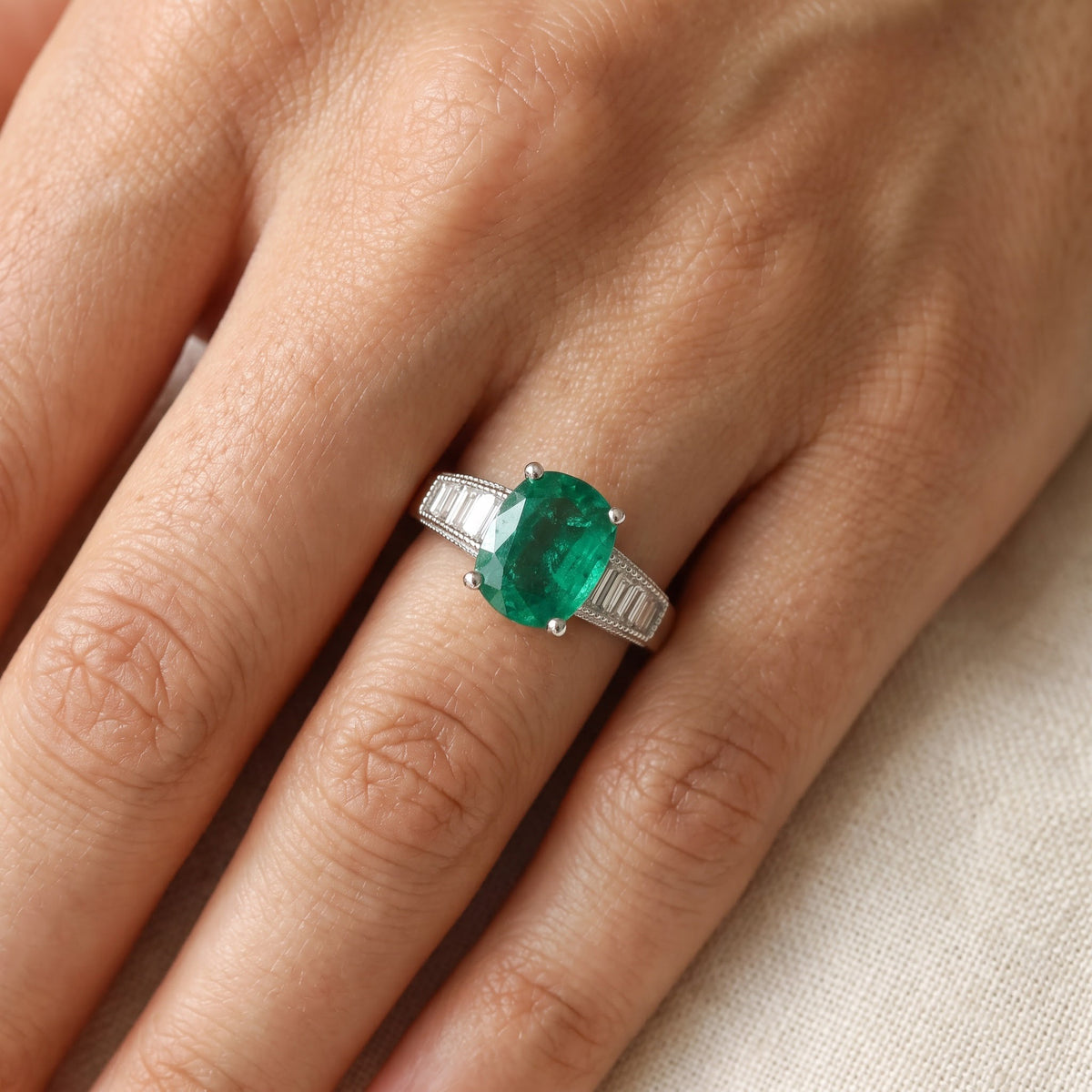 Emerald and Diamond Baguette Ring in White Gold, worn