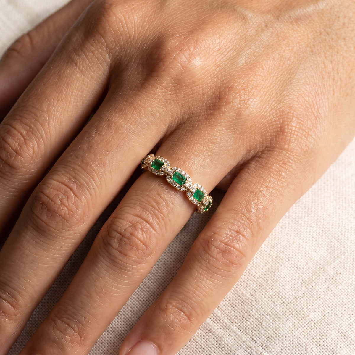 Emerald and Diamond Halo Link Band in Yellow Gold, worn