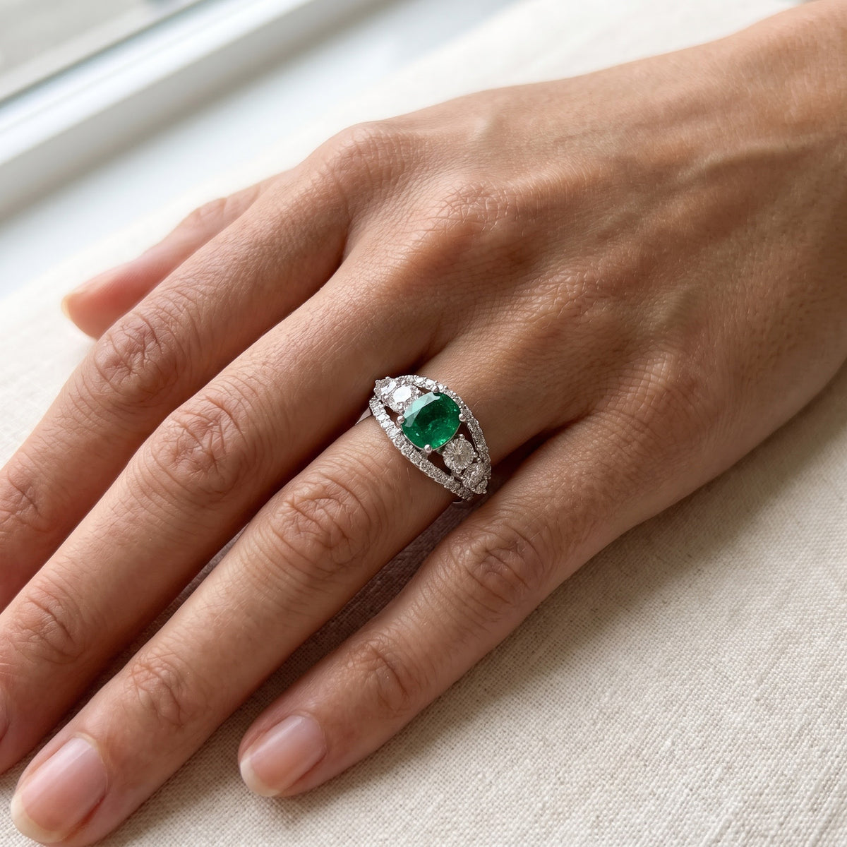 Emerald and Diamond Ring in White Gold, worn
