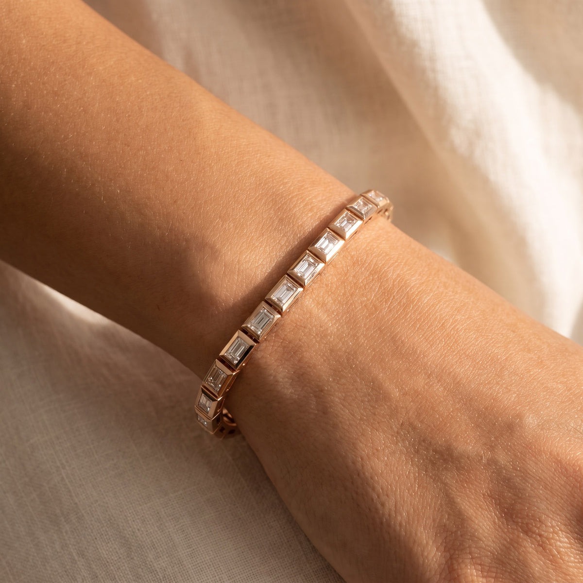 Emerald Cut Diamond Tennis Bracelet in Rose Gold, worn